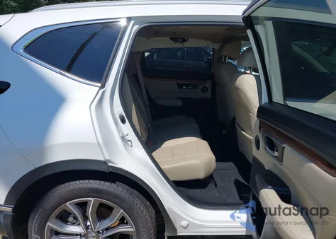 2021 Honda Cr-V 2Wd Touring from USA, damaged, VIN 2HKRW1H93MH420682